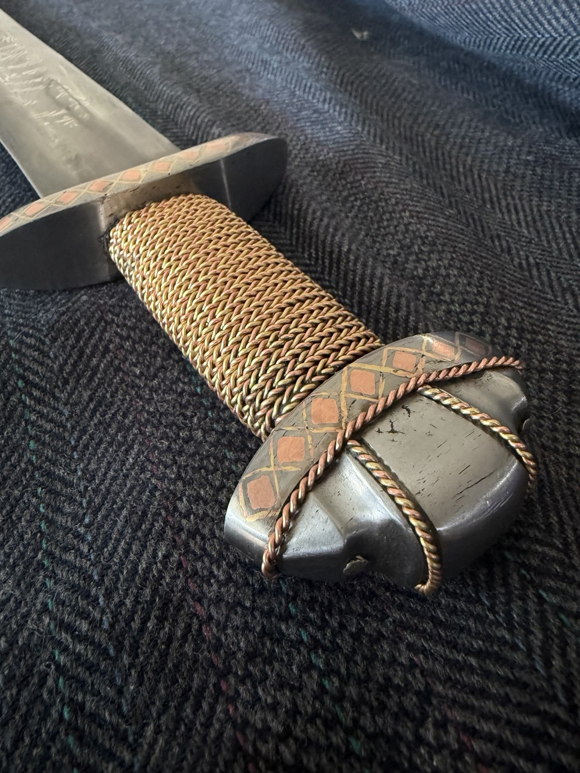 Trilobate pommel and wire wrapped handle